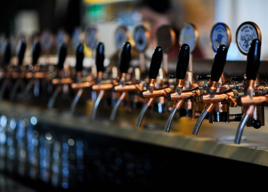Beer taps lined up behind the bar